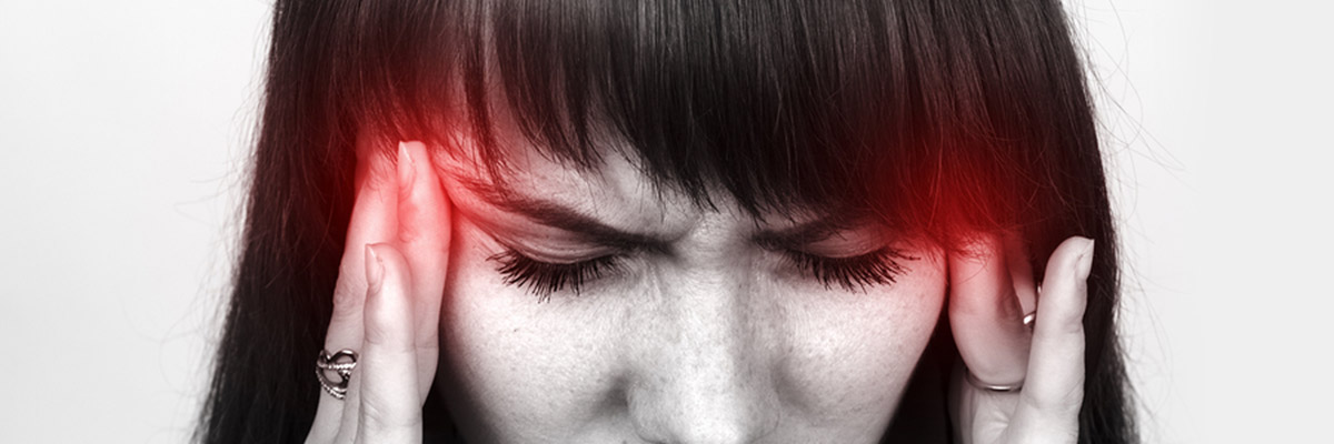 woman with terrible headache