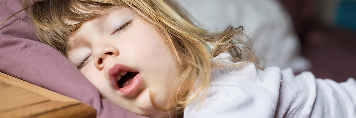 little girl sleeping with mouth open