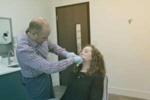 Dr Klauer with Patient